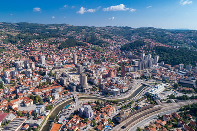 High angle view of street amidst buildings in city