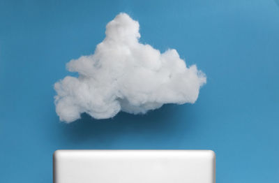 White cloud against blue background