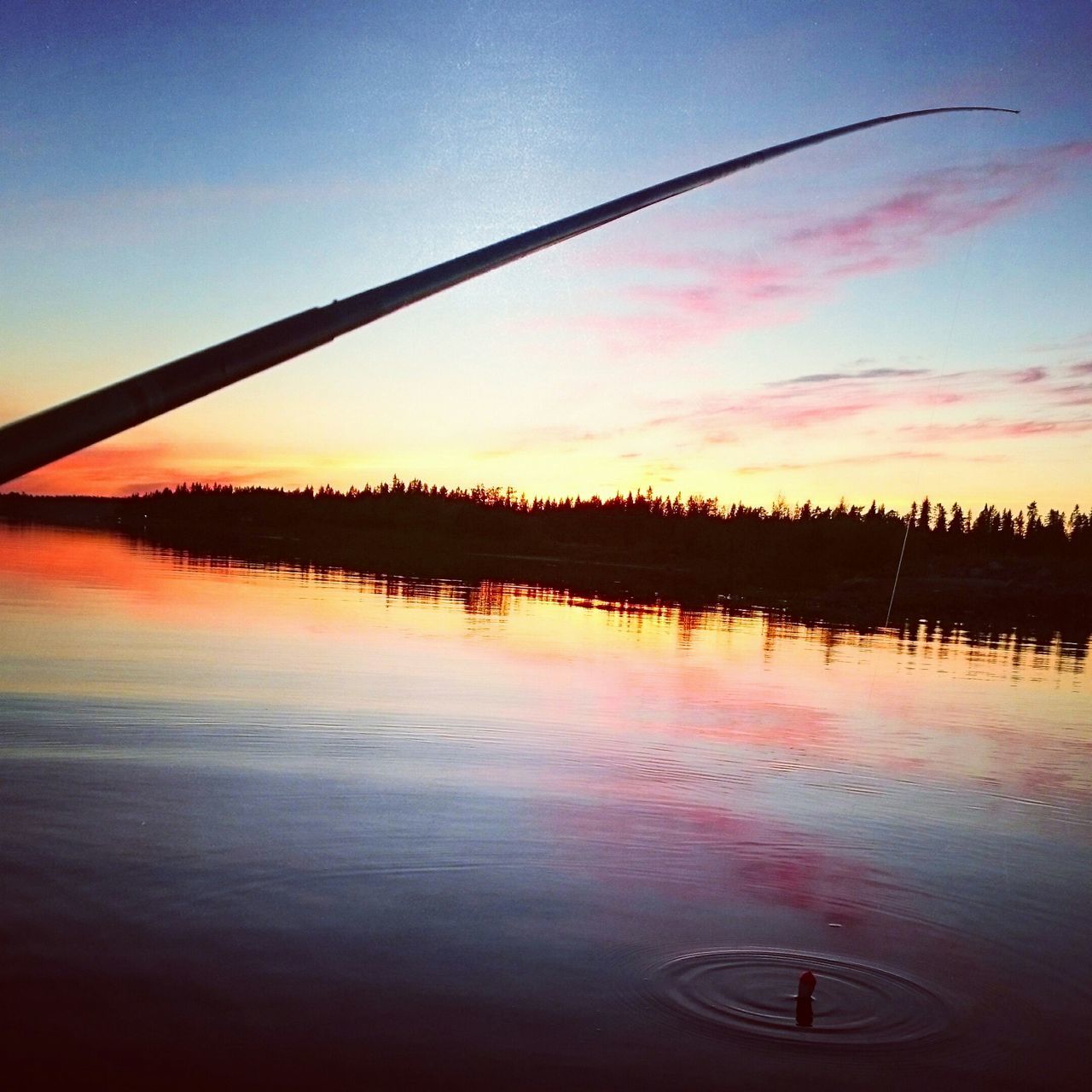 sunset, water, reflection, silhouette, orange color, sky, tranquility, tranquil scene, scenics, beauty in nature, waterfront, nature, lake, idyllic, dusk, outdoors, power line, no people, cloud - sky, standing water