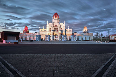 View of buildings in city at dusk