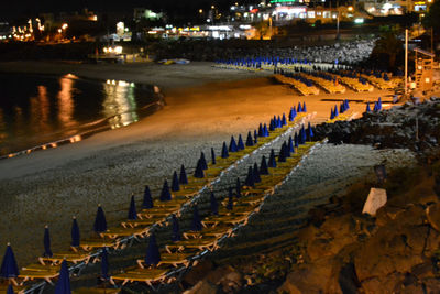 High angle view of illuminated cemetery at night