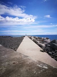 Surface level of sea shore against sky