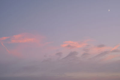 Low angle view of dramatic sky during sunset