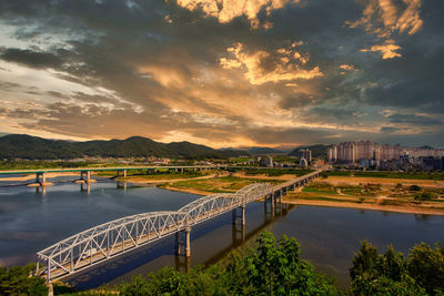 Landscape of gongju, korea. at sunset, showing the bridge and the river