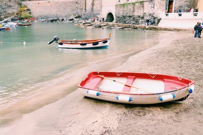 Boat moored on shore
