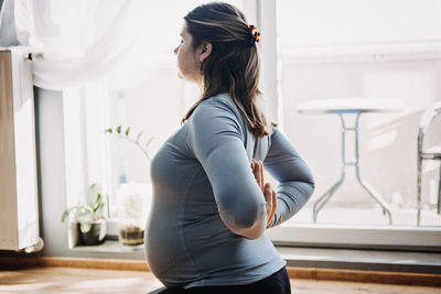 Benefits of prenatal yoga for pregnant women, including stress relief and improved flexibility