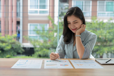 Businesswoman working at office