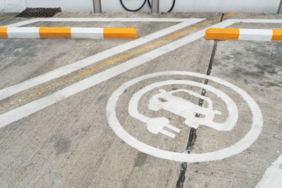 High angle view of road sign on snow