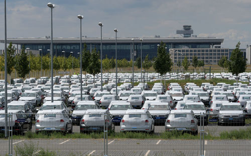 Row of parking lot against sky