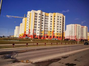 Road with buildings in background