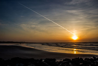 Scenic view of sea against sky during sunset