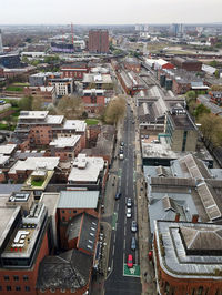 High angle view of street amidst buildings in city