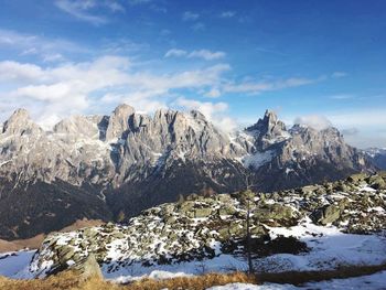 Scenic view of snowcapped mountains against sky