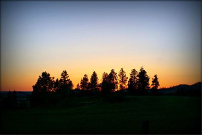 Scenic view of landscape at sunset