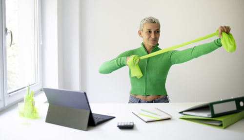 Portrait of young businesswoman working in office