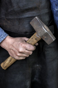 Hand with hammer