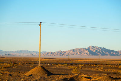 Scenic view of desert against clear sky