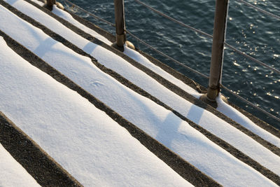 High angle view of railing in winter