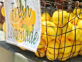 Close-up of yellow fruits for sale at market stall