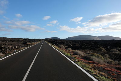 Surface level of road against sky