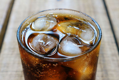 High angle view of ice tea on table
