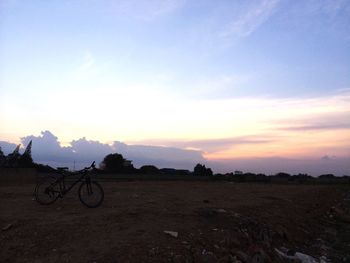 Scenic view of landscape against sky during sunset