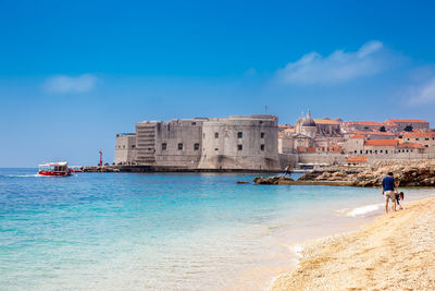 The beautiful banje beach and dubrovnik city