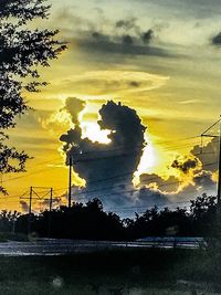 Scenic view of cloudy sky at sunset