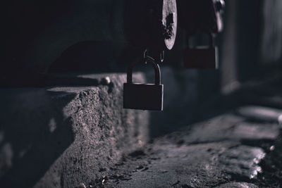 Close-up of padlocks hanging on wall