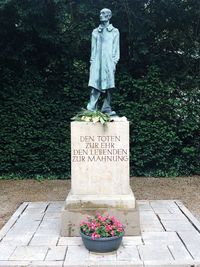 View of statue on footpath