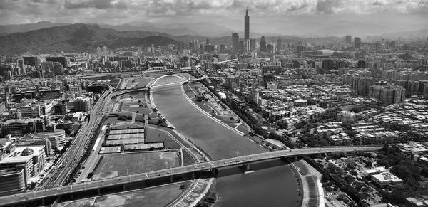 High angle view of suspension bridge in city