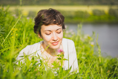 Portrait of man on grassy field