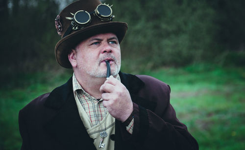 Portrait of man wearing mask outdoors