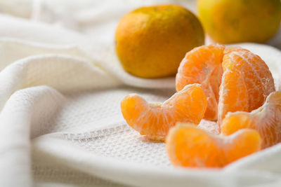 Close-up of orange fruits on table