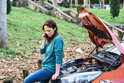 Woman sitting in car