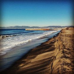 Scenic view of sea against clear sky