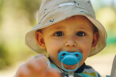 Portrait of cute boy outdoors