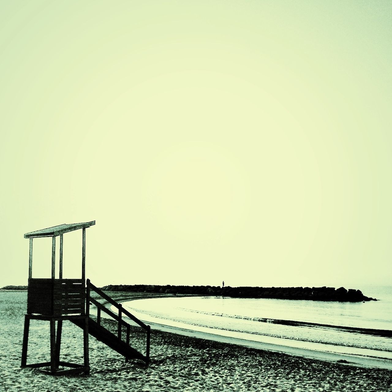 sea, clear sky, water, copy space, horizon over water, beach, tranquility, tranquil scene, scenics, nature, pier, beauty in nature, built structure, shore, sky, outdoors, idyllic, jetty, no people, day