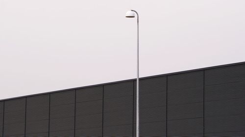 Low angle view of street light against clear sky