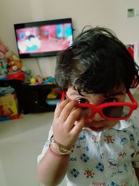 Close-up portrait of boy wearing sunglasses