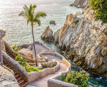 High angle view of steps leading to sea