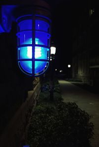 Illuminated street light at night