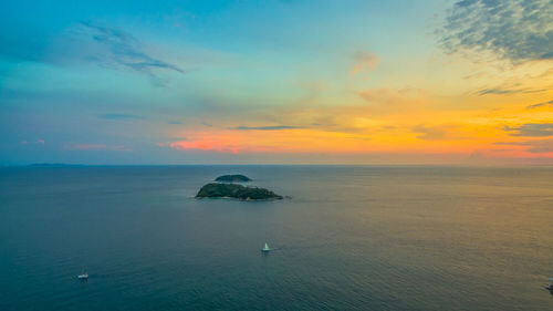 Scenic view of sea against sky during sunset