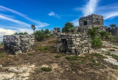 Low angle view of old ruins against sky