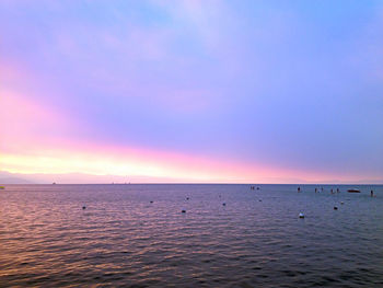 Scenic view of sea at sunset