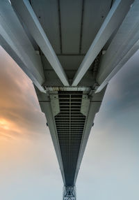 Low angle view of bridge against sky during sunset