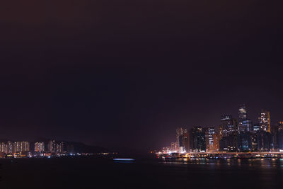 Illuminated city at night hong kong island 