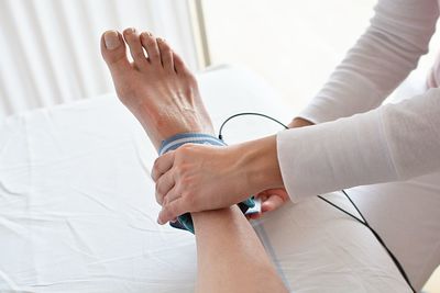 High angle view of nurse operating patient