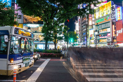 Cars on street in city at night