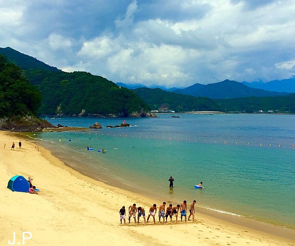 TOURISTS ON BEACH